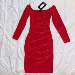 Pretty little thing dress. Size US 4. Off the shoulder bodycon long sleeves.